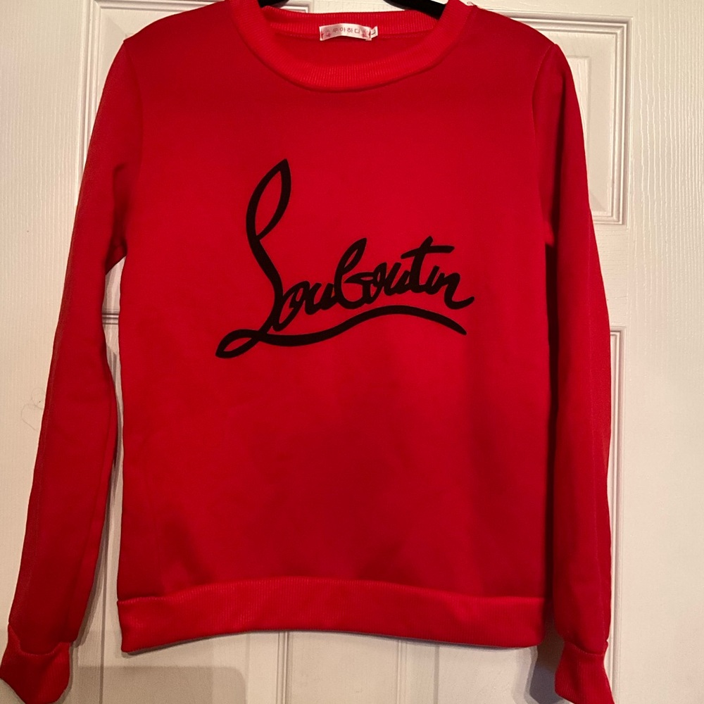 Red sweatshirt runs small